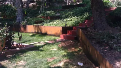 Rustic Steel Retaining Wall — Landscape Construction project by OMG Landscape And Garden Services