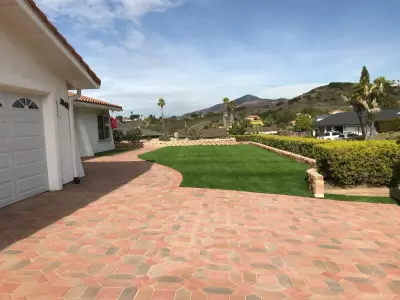 Grass and paving stones — Home Renovation & Remodeling Services project by SBX ECO Construction, Inc.