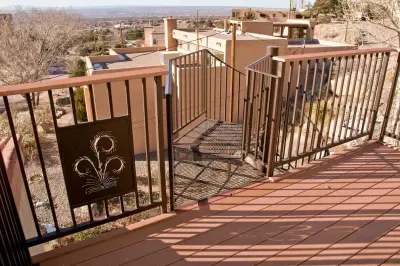 Ironwork Marvels: Deck and Stair Design — Home Renovation & Remodeling Services project by Arch Design, Inc