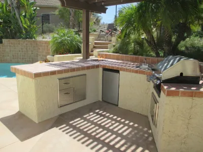 Patio with Barbeque and Fire Pit in Vista CA — Landscape Construction project by Pacific Dreamscapes