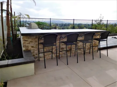 Outdoor Kitchen and concrete — Landscape Construction project by Pacific Dreamscapes