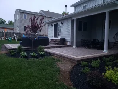 Cambridge Bi-Level Patio with Fire Pit and Landscape Installation — Landscape Construction project by Paradise Pavers Pond Landscaping LLC