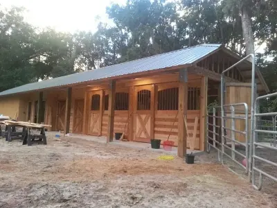 Cedar Sliding Stall Doors for Webb Barn — Home Renovation & Remodeling Services project by All Florida Custom Homes