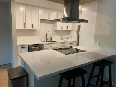 Spacious Kitchen with Cooktop Island — Home Renovation & Remodeling Services project by Lake Tahoe Construction Services, INC.