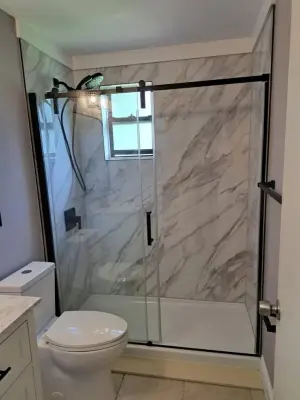 Marble White Bathroom Renovation — Home Renovation & Remodeling Services project by Level Up Construction & Investment Group LLC