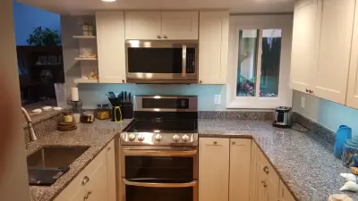 Contemporary White Kitchen — Home Renovation & Remodeling Services project by All Phase Home Solutions