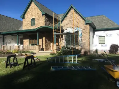 Window, Siding, and Stone Installation — Home Renovation & Remodeling Services project by DBC Remodeling & Construction LLC