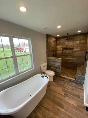 Master Bathroom with Wood-Look Shower — Home Renovation & Remodeling Services project by Bailey Home Services LLC