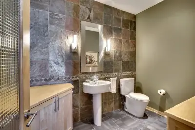 Contemporary Powder Room in Woodbury — Home Renovation & Remodeling Services project by Zinran Construction Services Inc.
