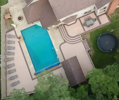 Updated Pool Deck and Fencing by Classic Decks & Fence LLC