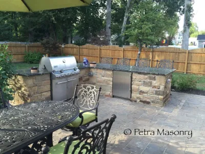 Kirkwood Fireplace,Kitchen, Patio — Landscape Construction project by Petra Masonry in Kirkwood