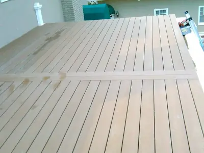 Outdoor relaxation area at Tulsa consulting company by Lazo Pro Patios & Decks