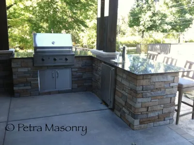 Outdoor Kitchen — Landscape Construction project by Petra Masonry