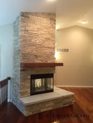 Interior Stone Fireplace — Landscape Construction project by Petra Masonry