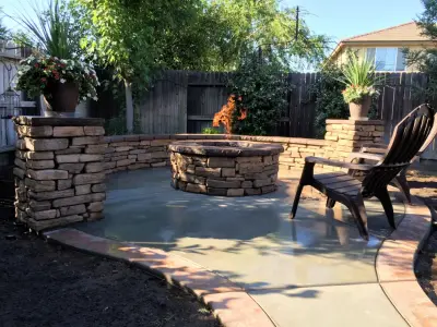 Exterior Fire Pits by Sunset Construction & Design