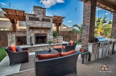 Katy, TX Stone Fireplace Outdoor Kitchen by Tradition Outdoor Living
