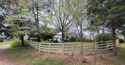 Custom Four-Board Fence - The Retreat by Troys Outdoor Services