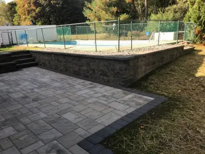 Outdoor Seating and Support Wall by Stoney Mountain Construction
