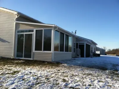 Sunroom Patio Enclosures — Deck Building & Repair project by Patio Enclosures