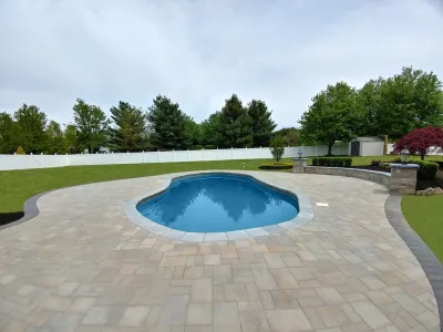 Pool Remodel & Landscape Design Under $30,000 - Manalapan, NJ — Landscape Construction project by Picture Perfect Landscaping & Outdoor Construction