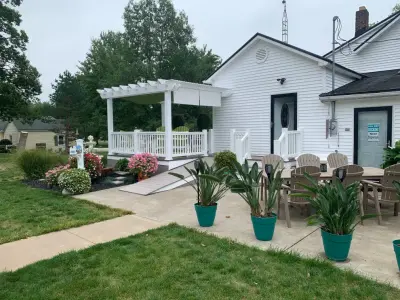 Deck and Ramp with Pergola by Classic Decks & Fence LLC