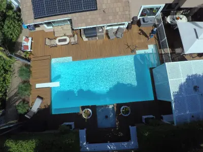 Decking around the pool — Deck Building & Repair project by MLW Construction