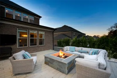 Outdoor Oasis with Swimming Pool and Culinary Area by The Stone Man