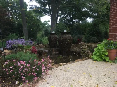 Water Feature with 2 Stacked Slated Urns - Grand Rapids, MI by Platinum Ponds & Landscaping