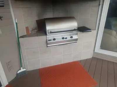 Elegant and Polished Outdoor Culinary Space — Deck Building & Repair project by Eagle Outdoor Living LLC
