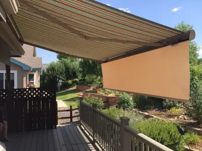 Adjustable awning with drop curtain — Deck Building & Repair project by Peterson Canvas