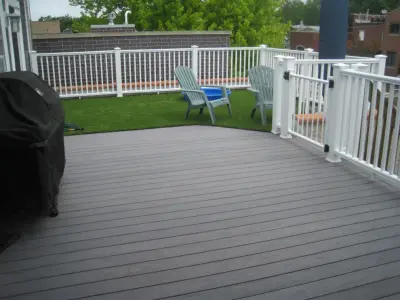 Chicago Roof Deck with White Pergola and Arbor by Unique Deck Builders