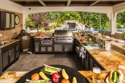 Brown Jordan Outdoor Kitchen with Artistic Cabinetry in Saint James, NY — Deck Building & Repair project by Outdoorliving By Kenneth Reilly
