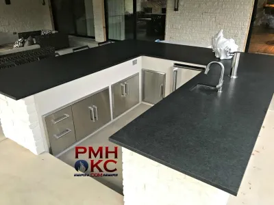 Modern Outdoor Living Space — Landscape Construction project by PMH Construction LLC.