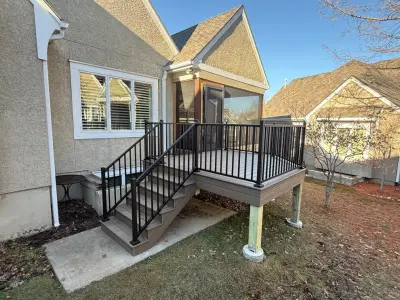 Porch with Screening and Composite Deck in Overland Park, Kansas by DW Elite Decks