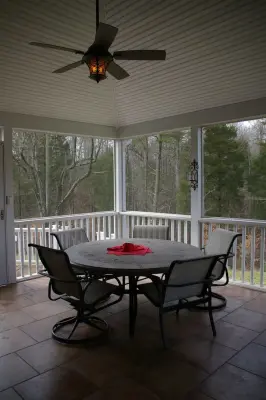 Tiled Screened Porch and Side Deck with Fiberon Ipe Flooring — Deck Building & Repair project by Deckscapes Inc