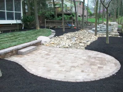 Water Feature and Patio in The Woods at Josephenum by Pony Lawncare And Landscaping