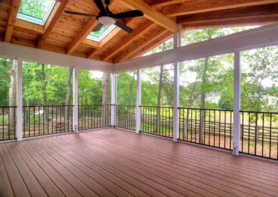 Porch Elegance Under the Skylight by M.C. Fence And Deck
