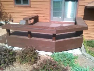 Compact back porch featuring seating benches — Deck Building & Repair project by BKH Development, LLC