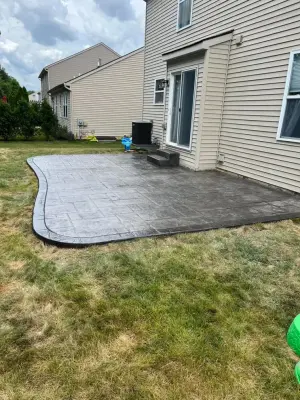 Imprinted Concrete Patio — Deck Building & Repair project by Rj Brothers Cement LLC