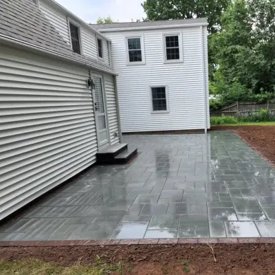 Stone Patio Initiative — Deck Building & Repair project by Alby's Masonry, LLC.
