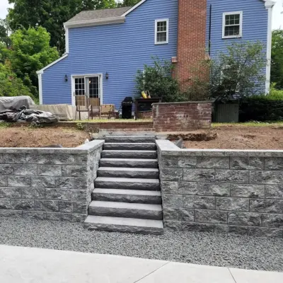 Stone Retaining Wall Construction and Design Project — Deck Building & Repair project by Alby's Masonry, LLC.