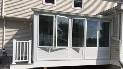 Sunroom Extension by New England Sunrooms & Conservatories, Inc.