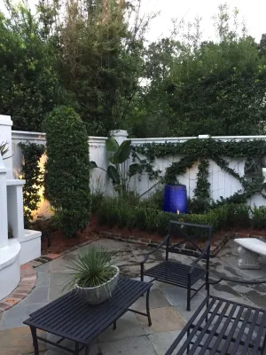 Peaceful Backyard Patio with Water Feature by Prados Landscapes LLC