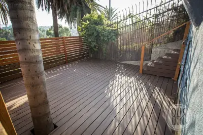 TimberTech Composite Decking and Privacy Fence Expansion by Olis Wood Inc.