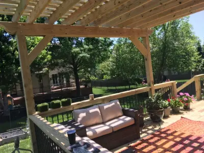 Pine Decking with Treated Wood, Two Wide Staircases, and a Pergola Addition — Deck Building & Repair project by The Deck Pro