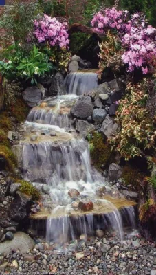 Pondless Waterfalls, Disappearing Waterfalls by Premier Ponds — Landscape Construction project by Premier Ponds