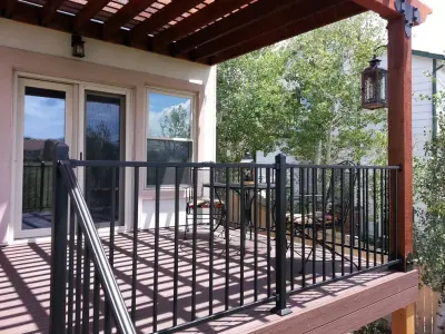 Trex Transcend Lava Rock featuring a Pergola by StoneCroft Construction
