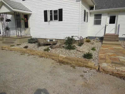 Beachy Property Landscaping, decorative grasses, driveway borders, edging — Landscape Construction project by Premiere Aquascapes