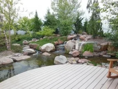 Middlebury Waterfall with Native field stone, waterfall and pond. Custom Design. — Landscape Construction project by Premiere Aquascapes