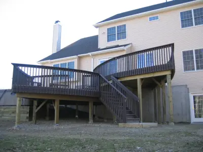 Incredible tiered Trex deck resembles a leaf — Deck Building & Repair project by American Deck Company